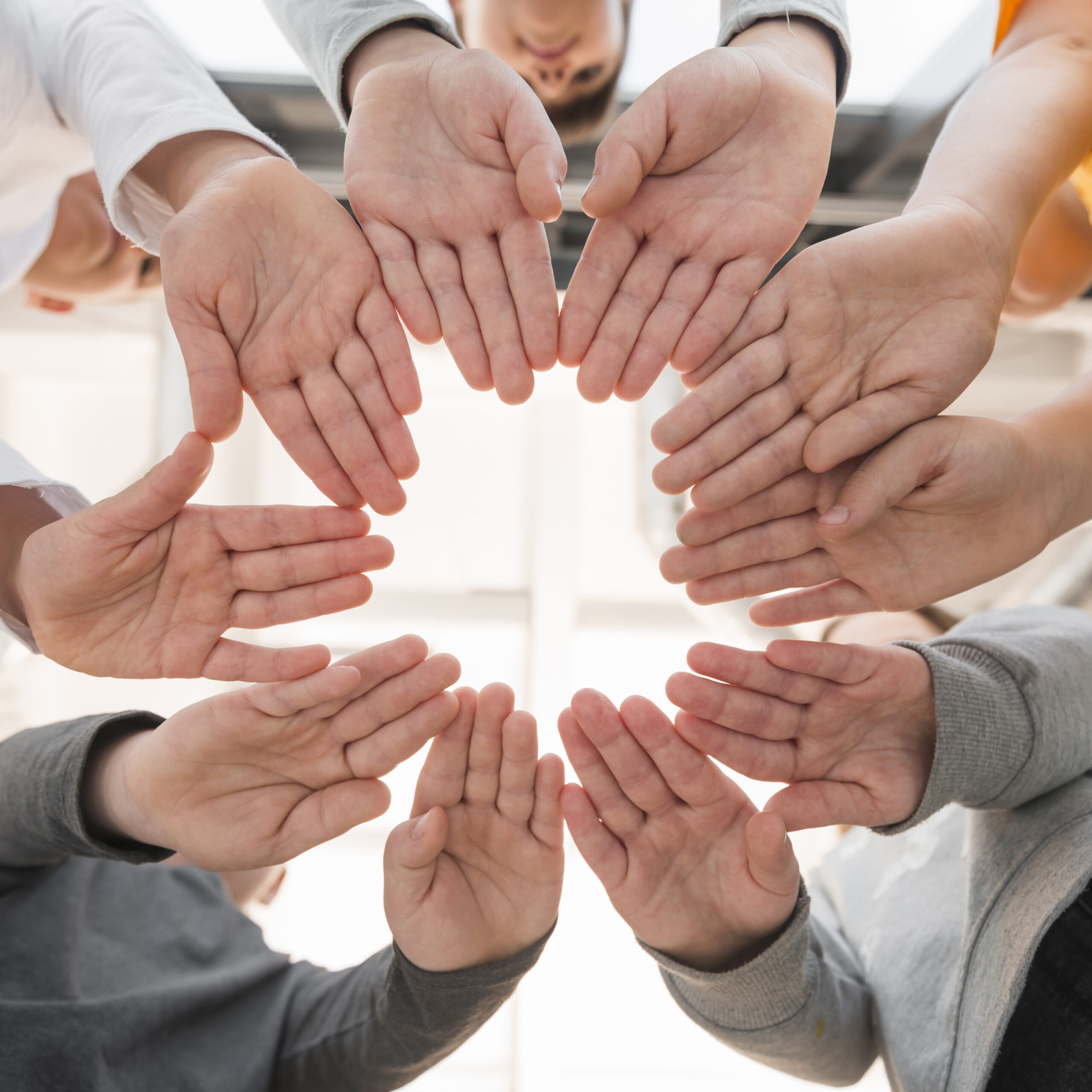 kids-hands-making-circle